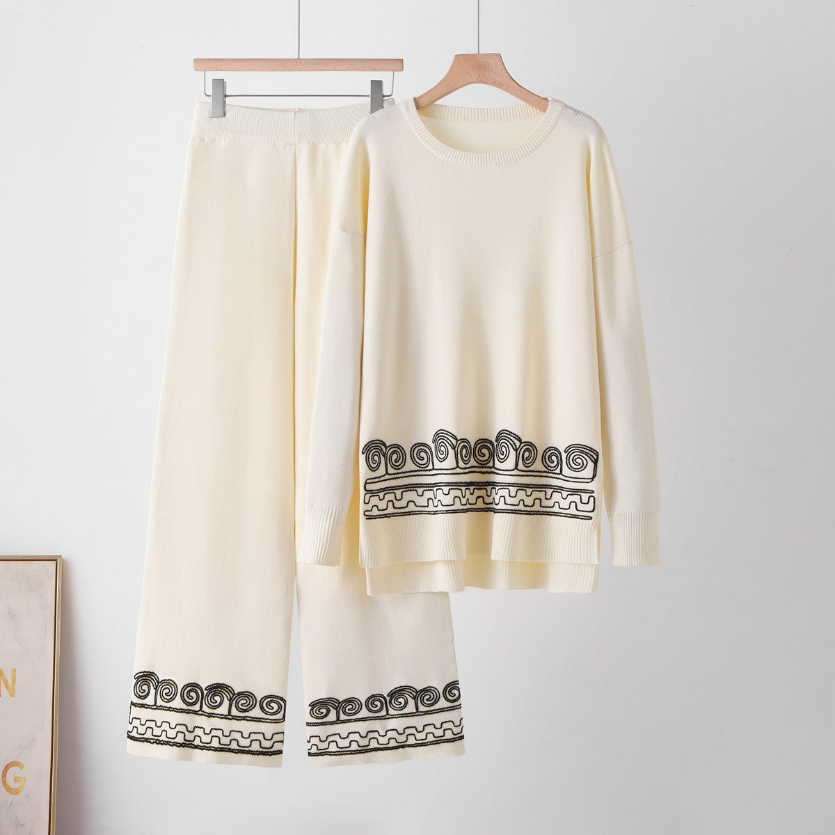Two piece set of patterned round neck top and wide leg pants