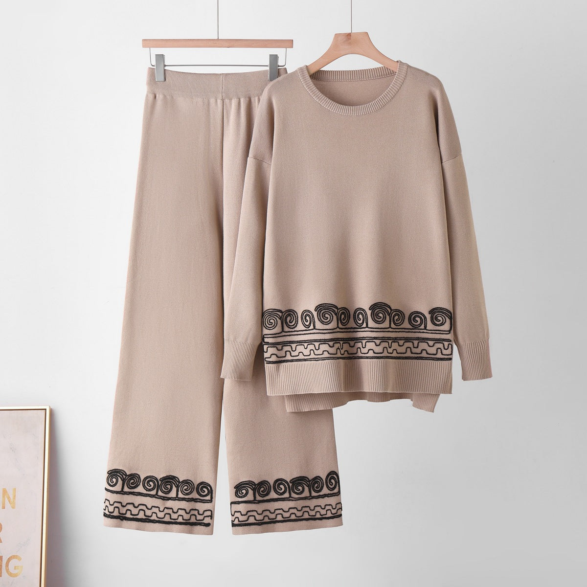 Two piece set of patterned round neck top and wide leg pants